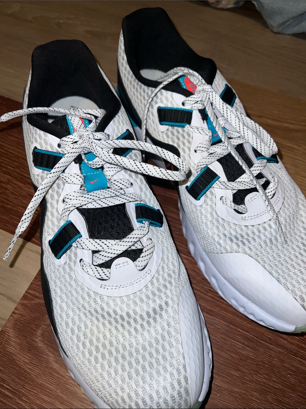 Nike Renew White, Black and Teal Athletic Shoes